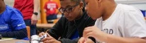 Learning STEM by Battling Robotic Cars and Exploring VR