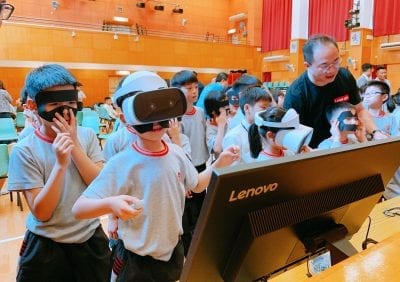 Students in Hong Kong with Lenovo's Mirage Solo VR headsets