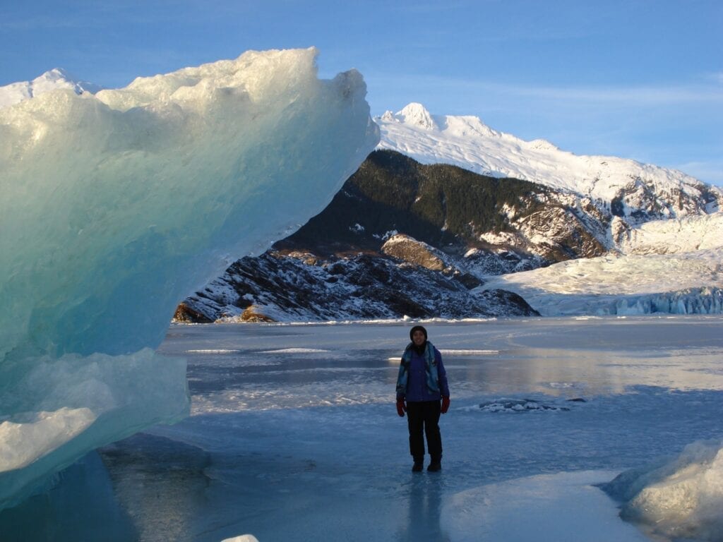 Haben Girma by an iceberg in Juneau, Alaska