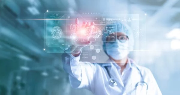 Doctor using floating screen overlay of medical data