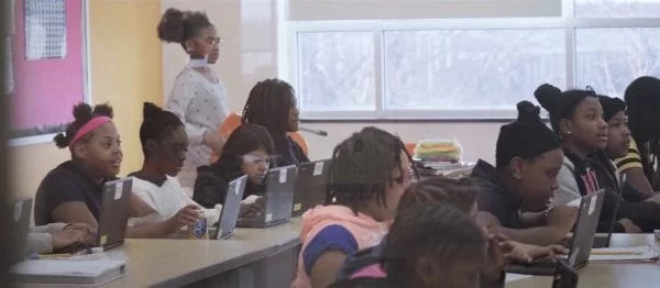 Classroom full of students using Lenovo PCs in Baltmore.