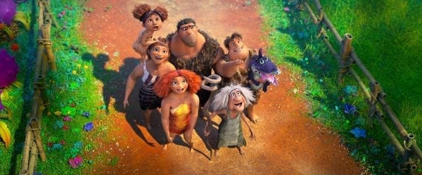 Characters from The Croods film seen from above, looking up.