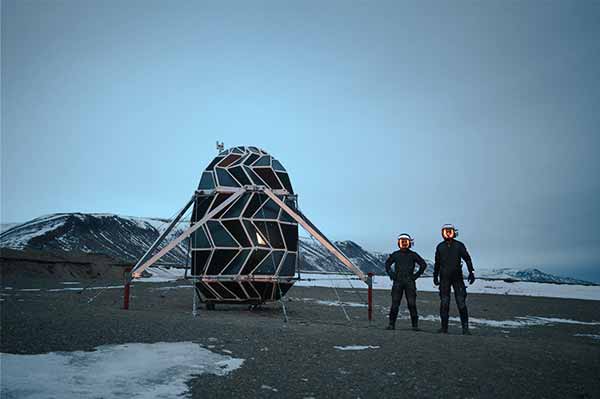 Sebastian and Karl outside the module in Greenland at the beginning of the expedition. Heavily compressed image shared via satellite phone with mission control. Courtesy SAGA Space Architects.