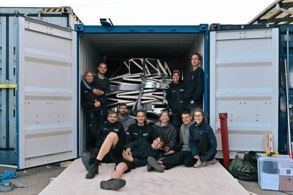 The Lunark team resting after successfully packing the habitat into a shipping crate for delivery to Greenland.