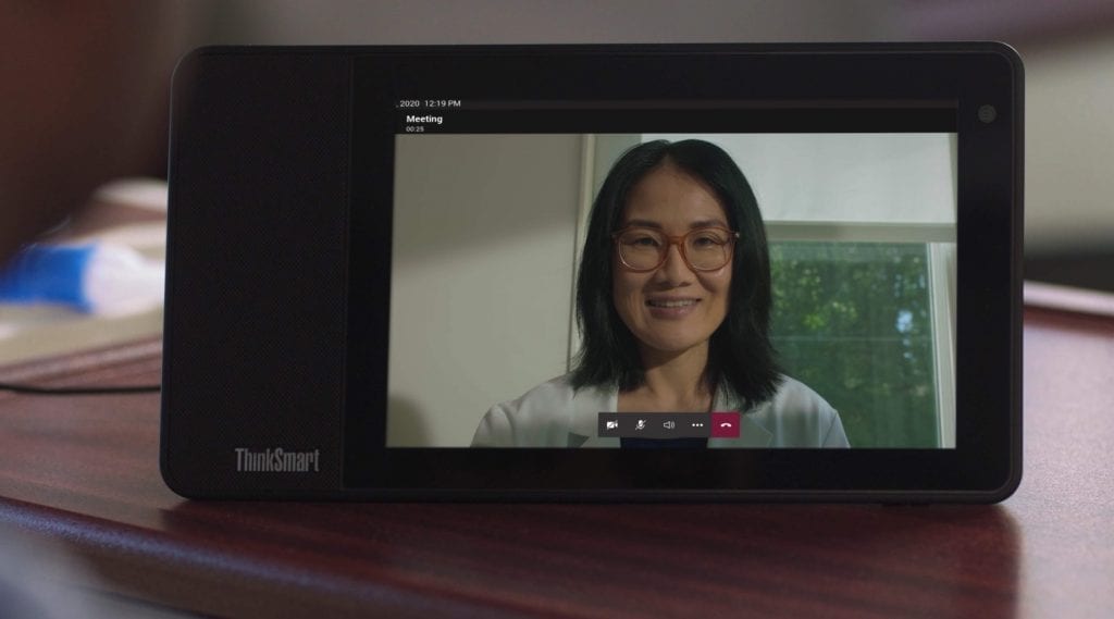 Doctor using Lenovo ThinkSmart device for Virtual Rounding