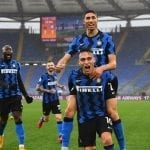 FC Inter teammates celebrating during a match