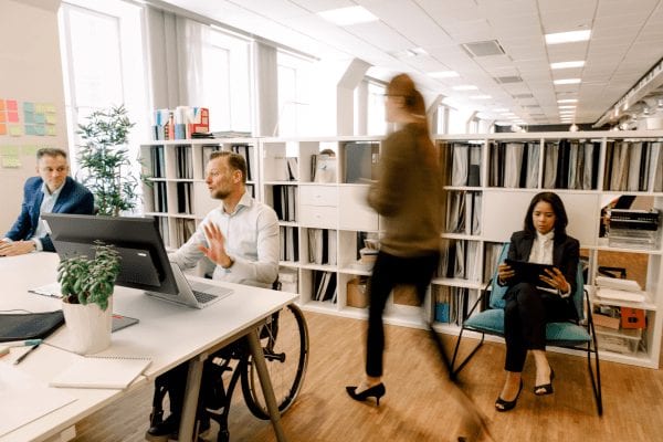 Office diversity stock image, including wheelchair-accessible desk
