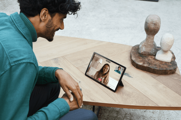 Person using Lenovo Tab P11 for a video call