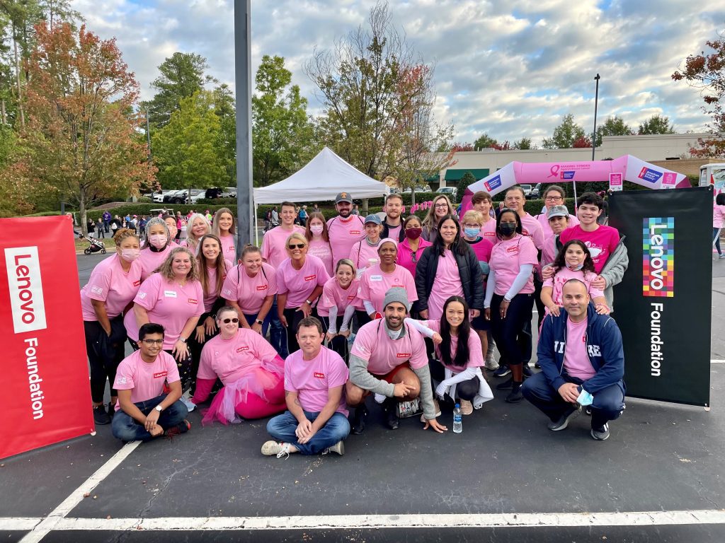 Lenovo employees wear their pink Love On t-shirts during the Making Strides Against Breast Cancer event.