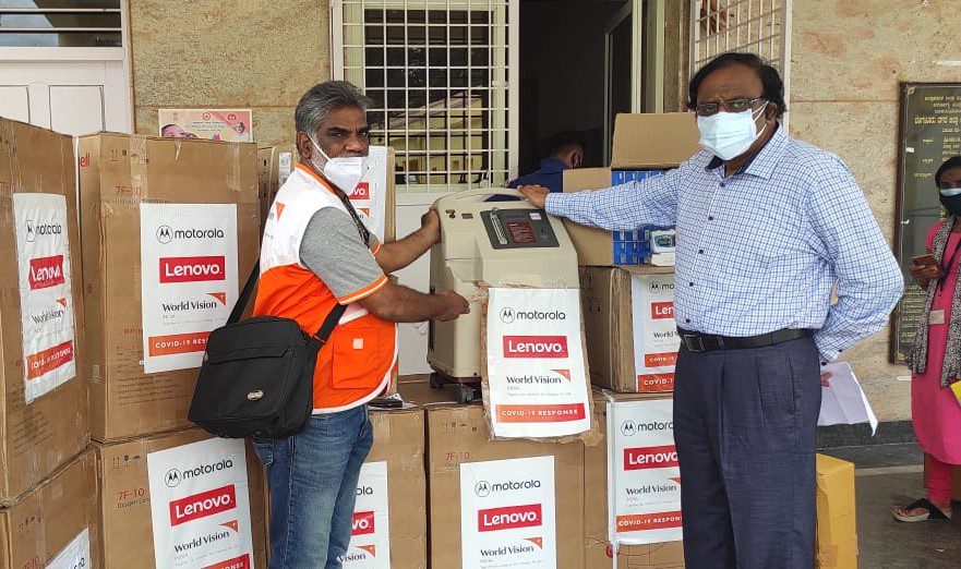 Boxes from Lenovo and World Vision stacked after delivery in India
