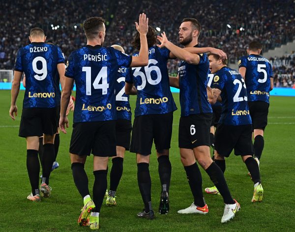 Ivan Perisic of FC Internazionale celebrates with team-mates after scoring the opening goal during the Serie A match between SS Lazio and FC Internazionale at Stadio Olimpico on October 16, 2021 in Rome, Italy.