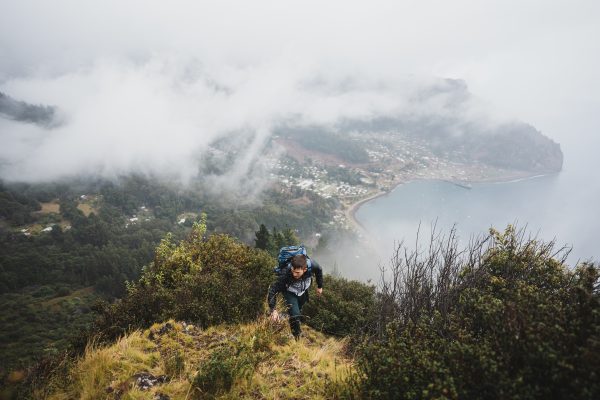 A Work for Humankind volunteer explores Robinson Crusoe Island, Chile