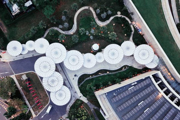 brand image - Aerial shot of landscape with circular architectural elements.