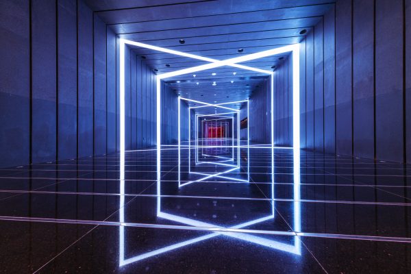 brand image - Square light frames over-lapping in darkly lit interior space.