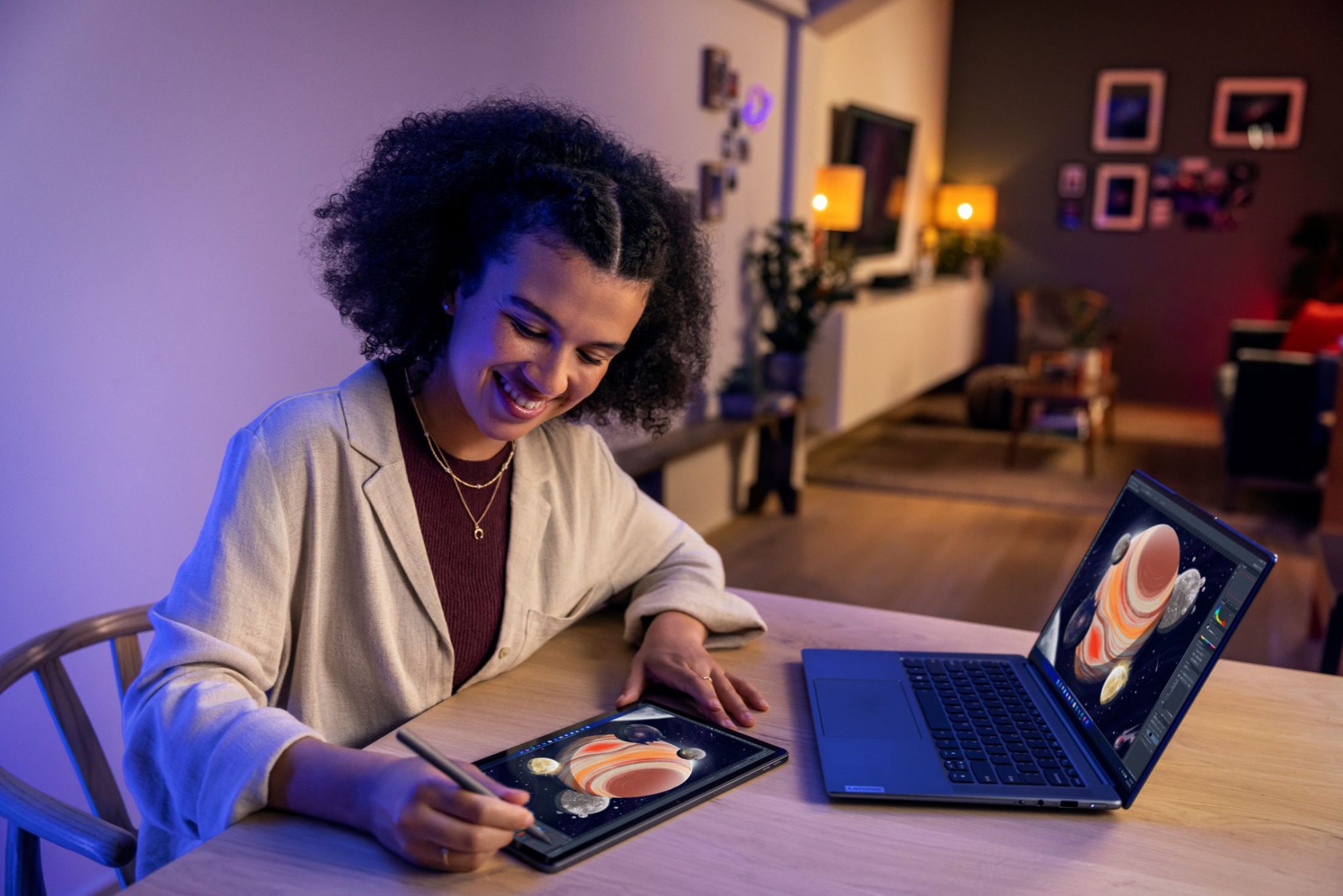 Person at table, using a pen on the Lenovo P11 Pro