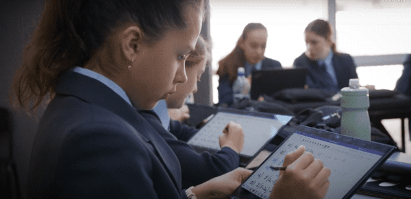 Students using tablets at All Saints College