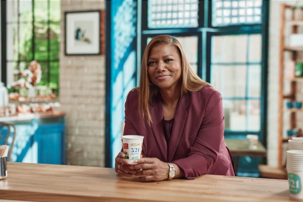 Queen Latifah with a cup of coffee