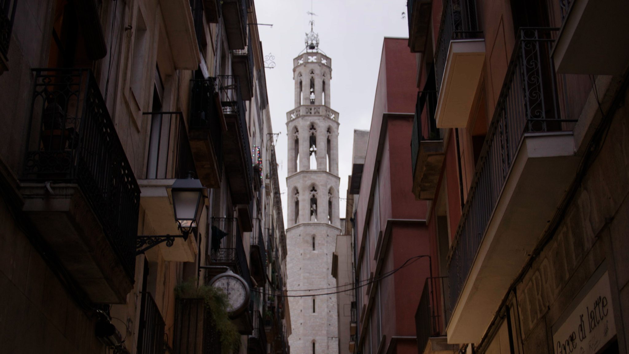 View up to a tower from the streets of Barcelona