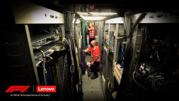 F1 and Lenovo: Two people working on server stacks