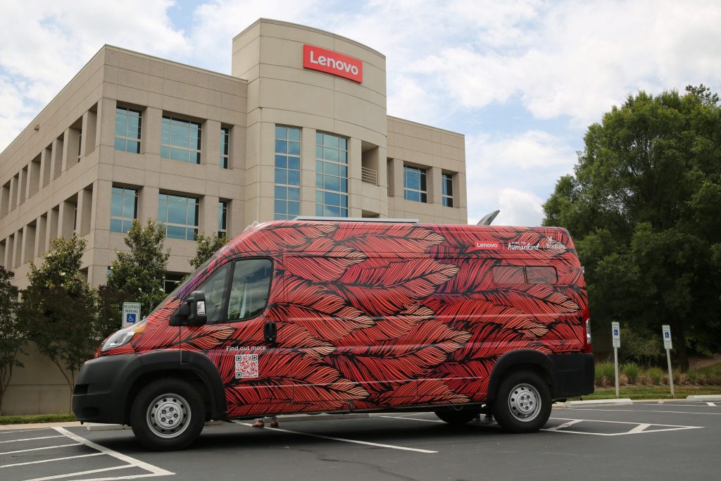 WFH: The brightly painted Birdlife van parked in front of the Lenovo office.