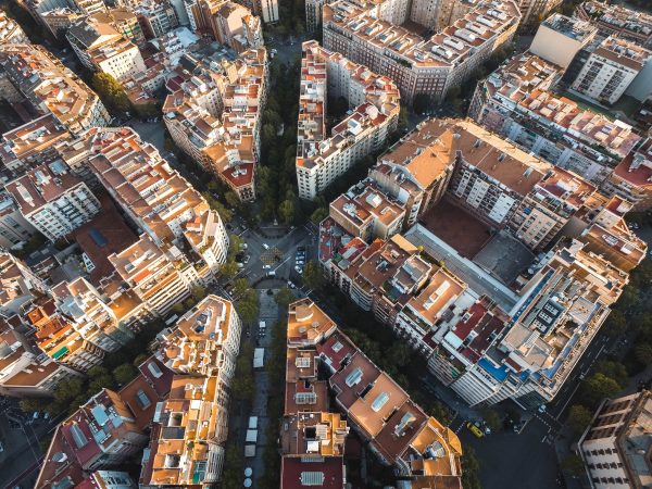 Birds eye view of Barcelona city, cross junction of roads and buildings