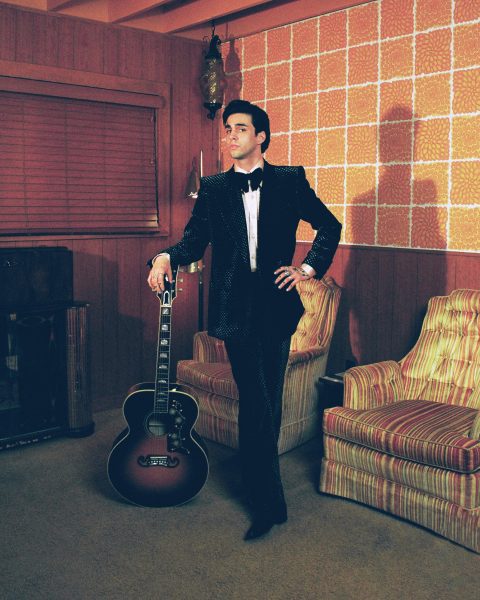 Stephen Sanchez posing with a guitar