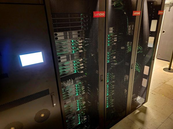 Server racks with Lenovo logos and green lights switched on
