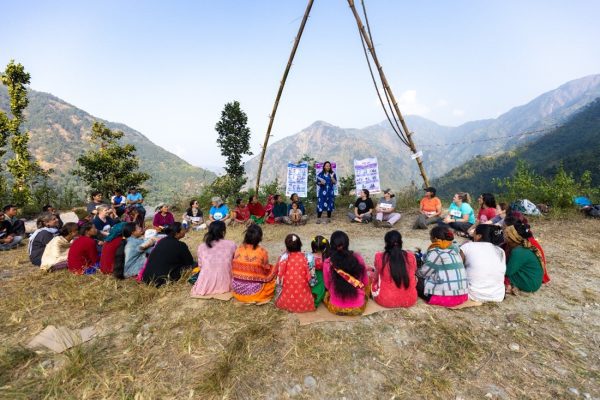 Community members in Katheswora, Nepal receive instruction about WASH principles and women’s health. 