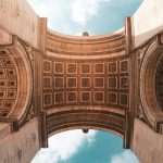low angel photo of the underside of Arc de Triomphe in Paris