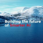 Building the future of Smarter AI text over image of mountains and water