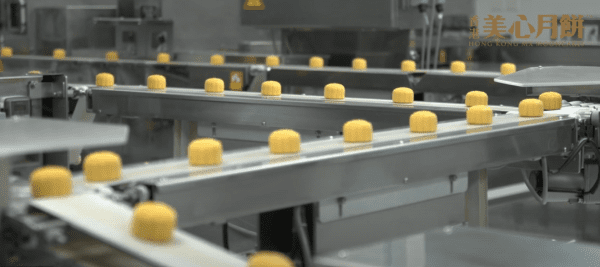Moon cakes on manufacturing line