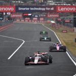 Formula One race in action with motorola and Lenovo branding